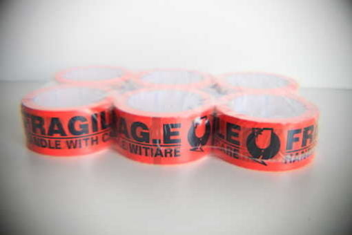 1.051: Nachi "Fragile HWC" Warning Tape Fluoro Orange